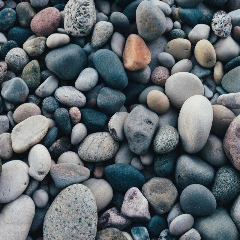 Smooth pebbles and natural stone texture